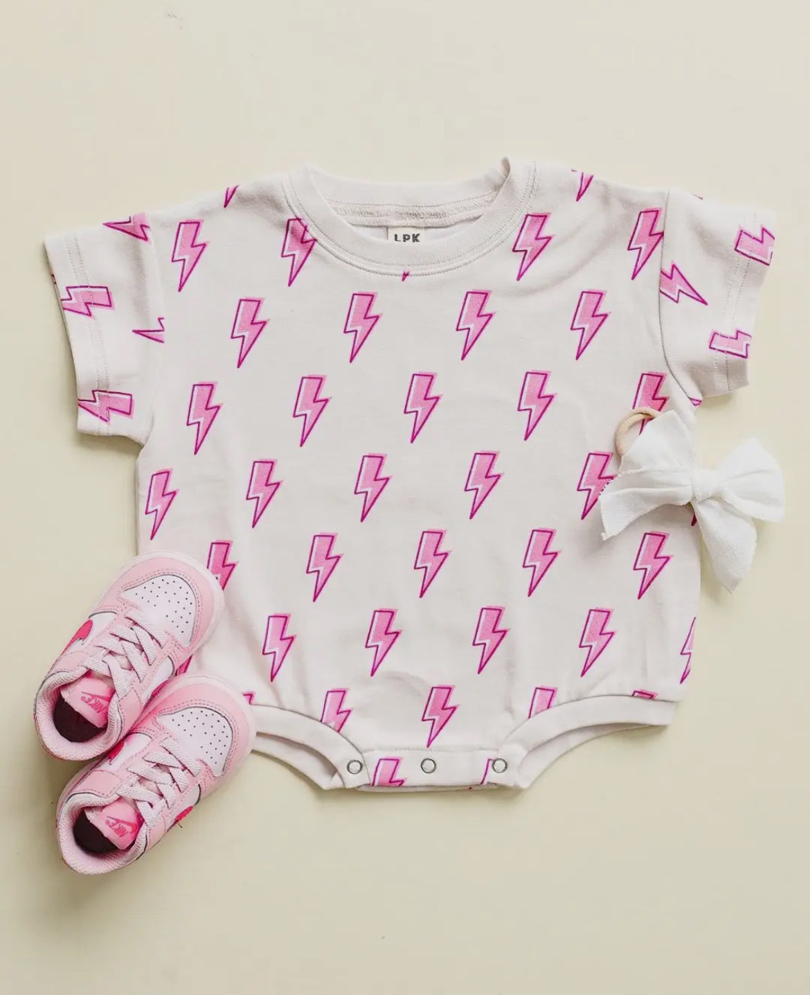 Short Sleeve Bubble Romper-Pink Bolts